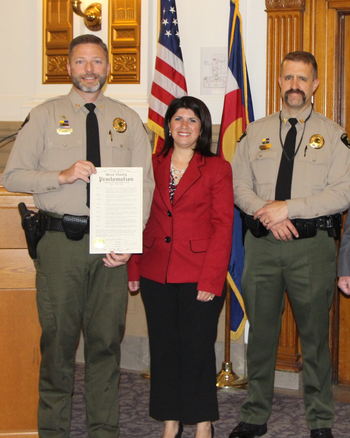 Rose with County Proclamation and Sheriff deputies
